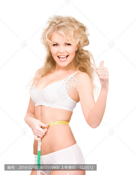 帶卷尺的年輕漂亮女人