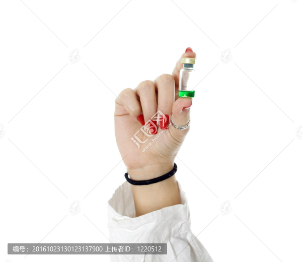 女醫(yī)生保持小瓶與綠色液體
