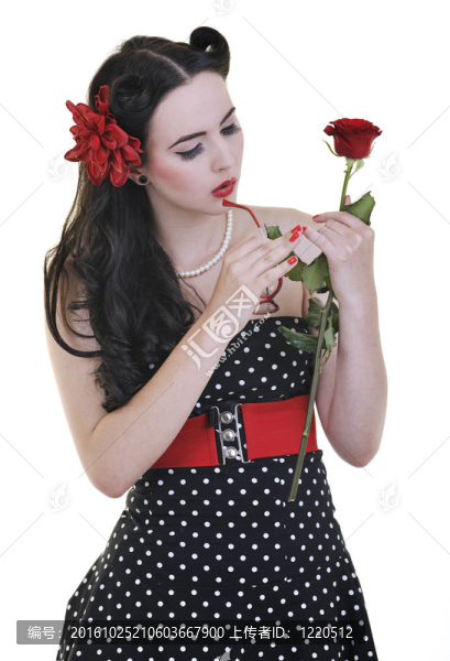 年輕的女人與白色的花隔離