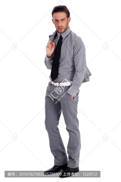 精明的商人站在他的西裝