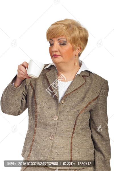 成熟的執(zhí)行女人喝咖啡