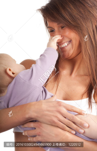 棕色頭發(fā)年輕漂亮的女人帶著兒子
