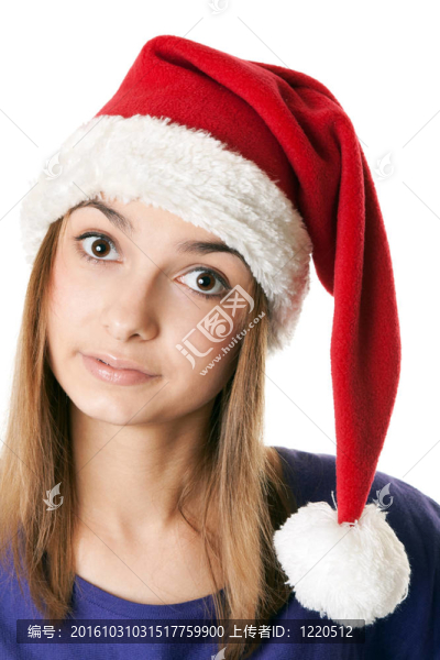 美麗的女孩在紅色Santa帽