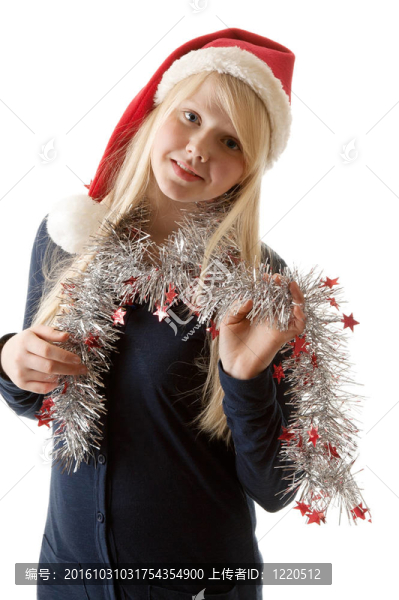 一個(gè)美麗的年輕金發(fā)女郎在Santa的帽子