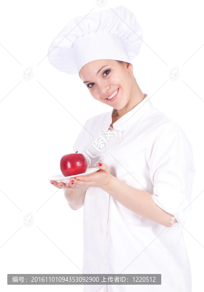 女廚師白色制服和帽子與蘋果