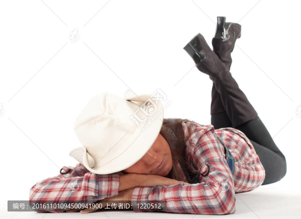 睡眠與鮮艷的帽子在格子襯衣的鄉(xiāng)下姑娘