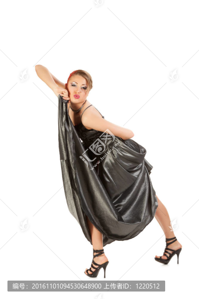 美麗的年輕女子在長禮服