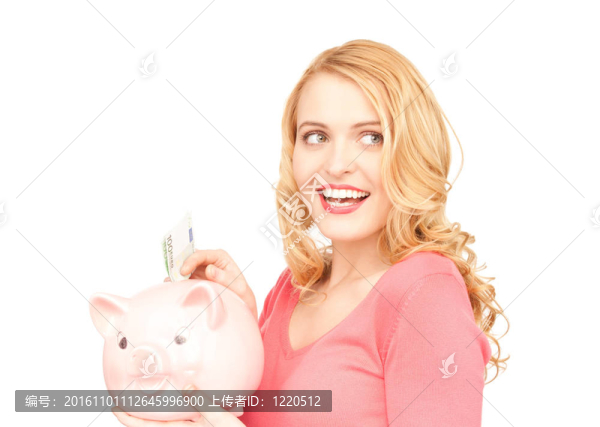 可愛的女人與儲(chǔ)蓄罐和錢