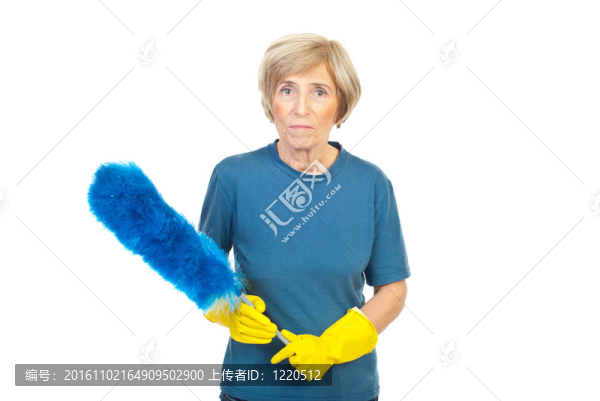 清潔女工拿著灰塵的刷子