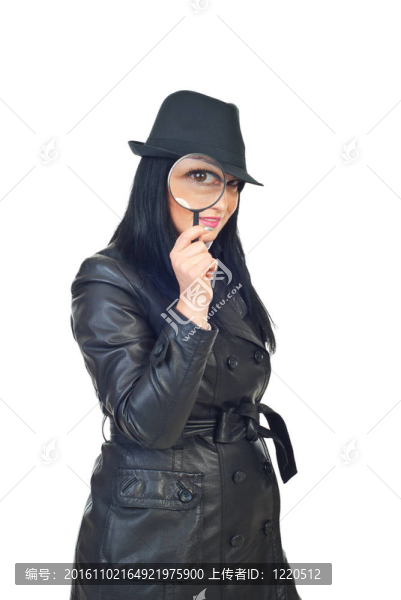 帶放大鏡的偵探女人