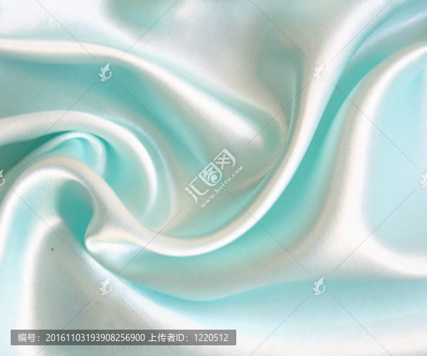 以流暢的優(yōu)雅的藍色絲綢為背景