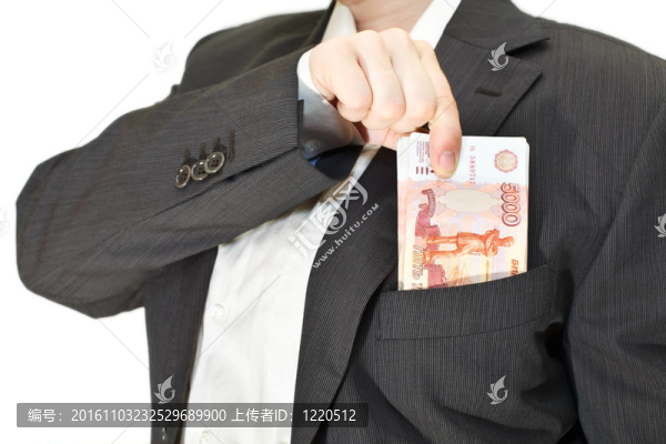 商人把錢放在口袋里