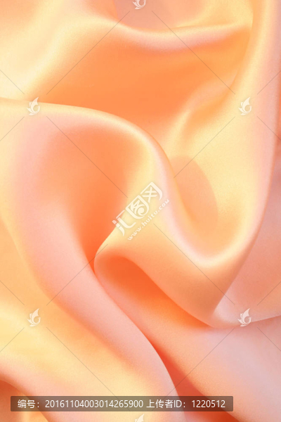 光滑典雅的金色粉色絲綢為背景