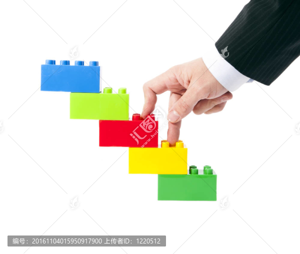 建筑玩具；成功的象征；商人的手