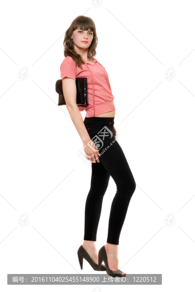 在一個黑色的緊身褲，年輕漂亮的女人