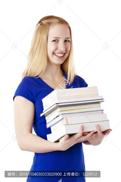 年輕；漂亮；金發(fā)女學(xué)生拿著書微笑