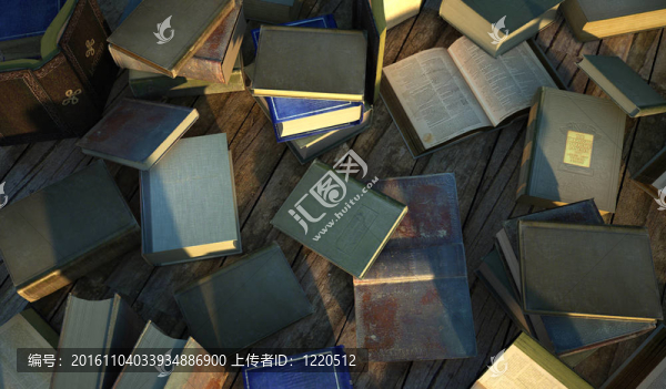 許多古老和古老的書籍；散布在一個(gè)木制的表面。