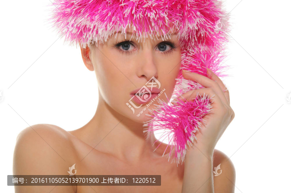 美麗的女人在粉紅色的帽子