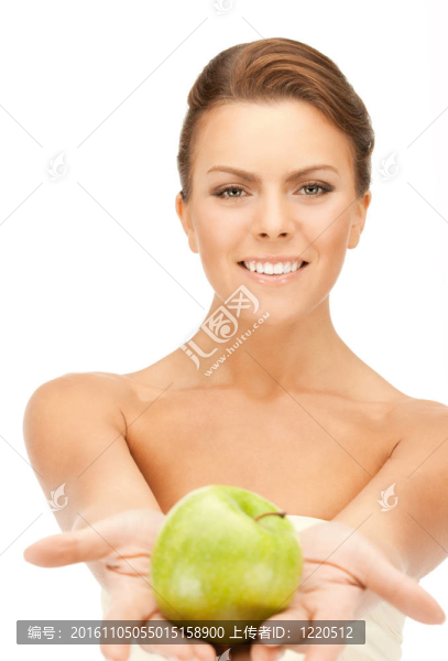年輕美麗的女人和綠色的蘋果