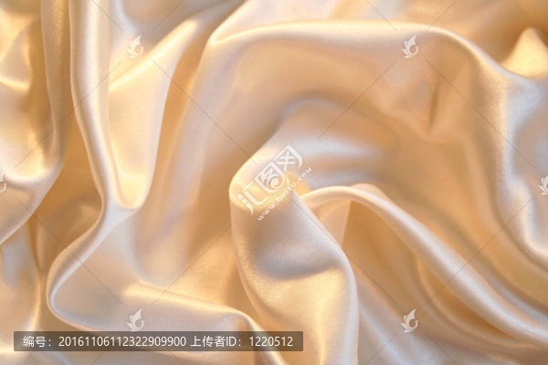 光滑典雅的金色絲綢為背景