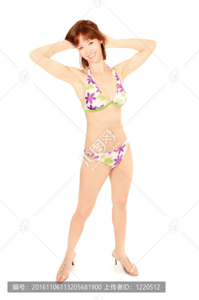 在豐富多彩的比基尼美麗的年輕女子的肖像
