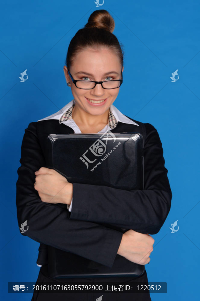 商業(yè)女人與筆記本電腦