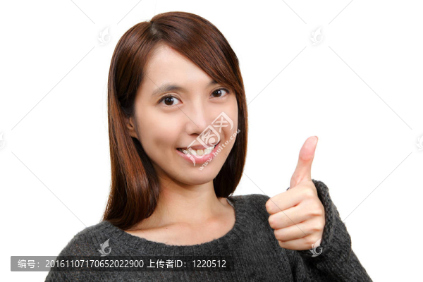 豎起大拇指的女人