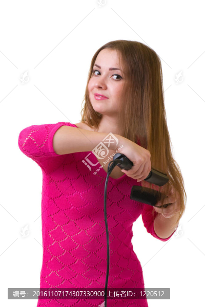 帶吹風(fēng)機(jī)的年輕女孩