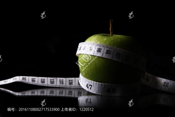 帶測(cè)量帶的蘋(píng)果