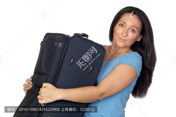 帶著沉重手提箱的女人