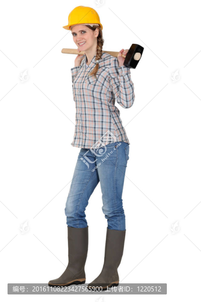 年輕女木匠手持錘子肖像