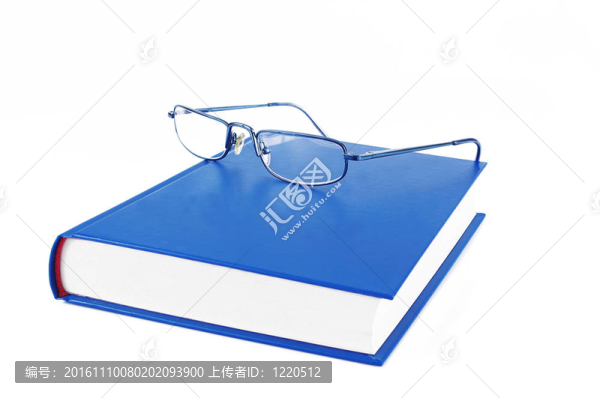 在藍(lán)色的書上的眼鏡