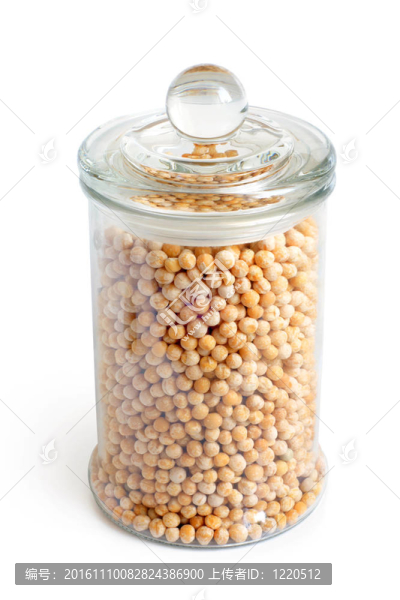 玻璃罐里的干黃色豌豆