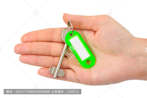 用標(biāo)簽的手和鑰匙