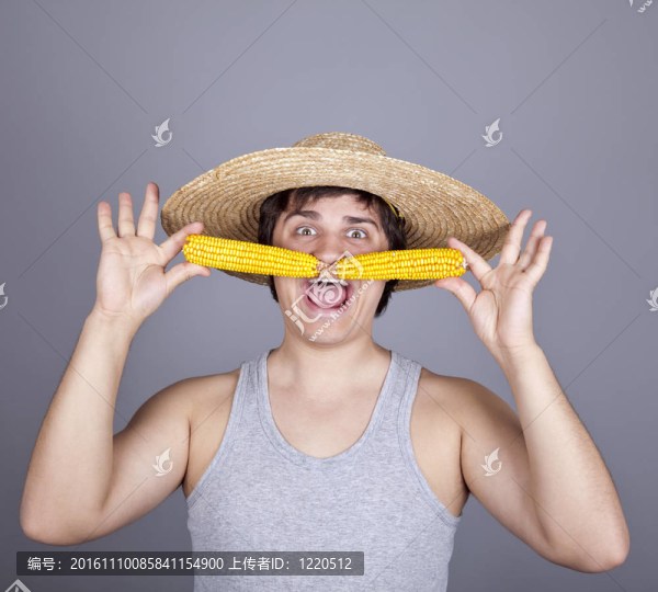 兩個玉米帽搞笑的農(nóng)民。