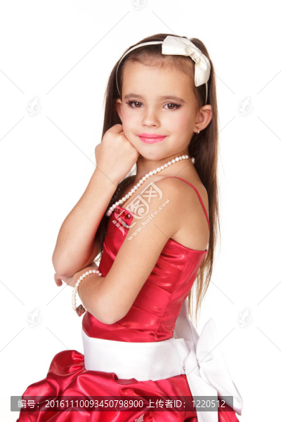 美麗的小女孩穿著紅色晚禮服