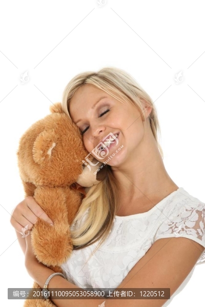 可愛的金發(fā)女人與玩具動物