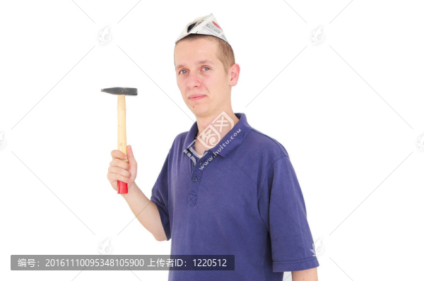 帶錘子的年輕工人