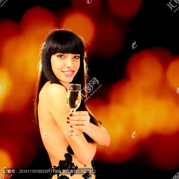 性感的女人與香檳玻璃