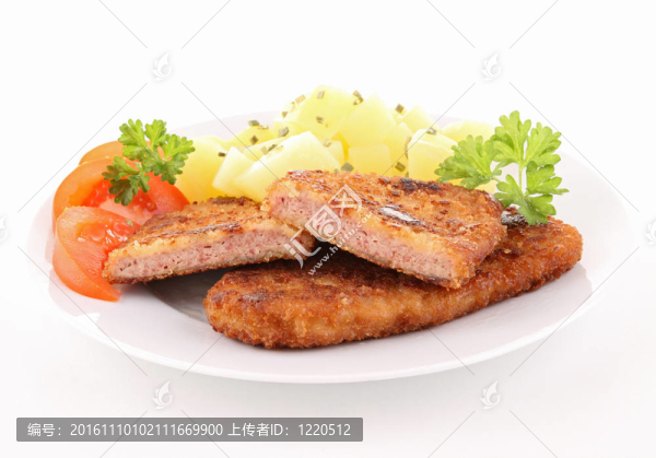 肉和蔬菜的面包板