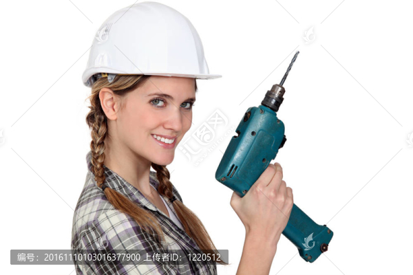 微笑的女商人手持電動工具