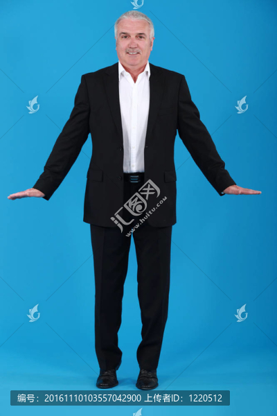 一個奇怪的姿勢成熟的商人。