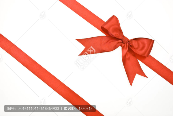 帶紅絲帶和蝴蝶結(jié)的禮品包裝