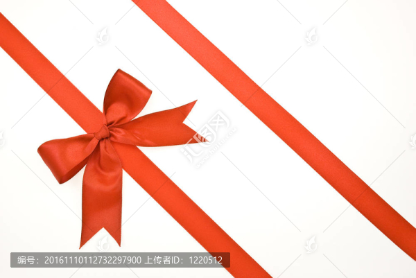 帶紅絲帶和蝴蝶結(jié)的禮品包裝