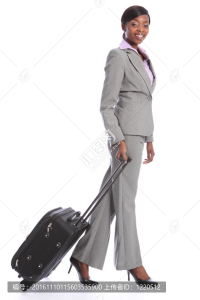 商務(wù)旅行年輕快樂的黑人婦女與案件