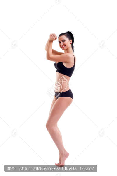運動胸罩中的年輕苗條女人
