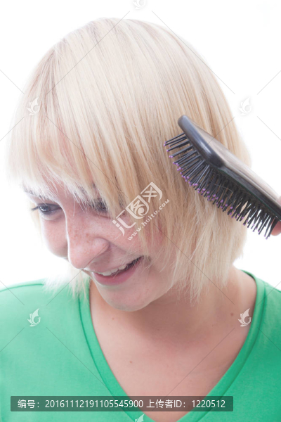 美女用卷發(fā)做發(fā)型