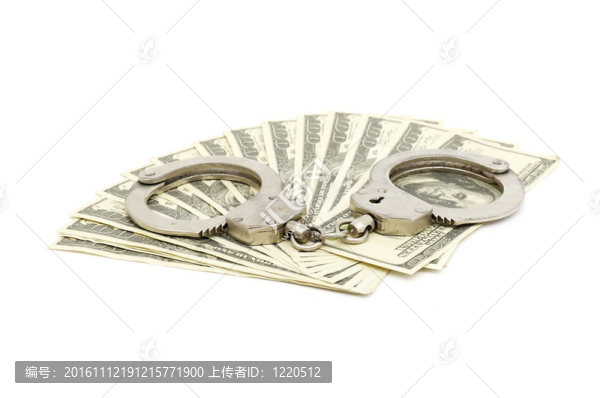 在金錢背景的手銬；