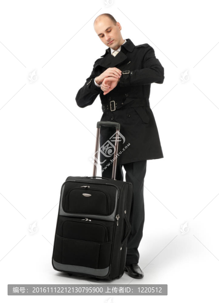 商務(wù)人員在機(jī)場(chǎng)候機(jī)室等候他的航班