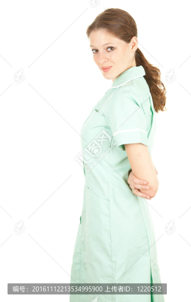 一位美麗的女性醫(yī)療保健醫(yī)生穿著藍(lán)色制服